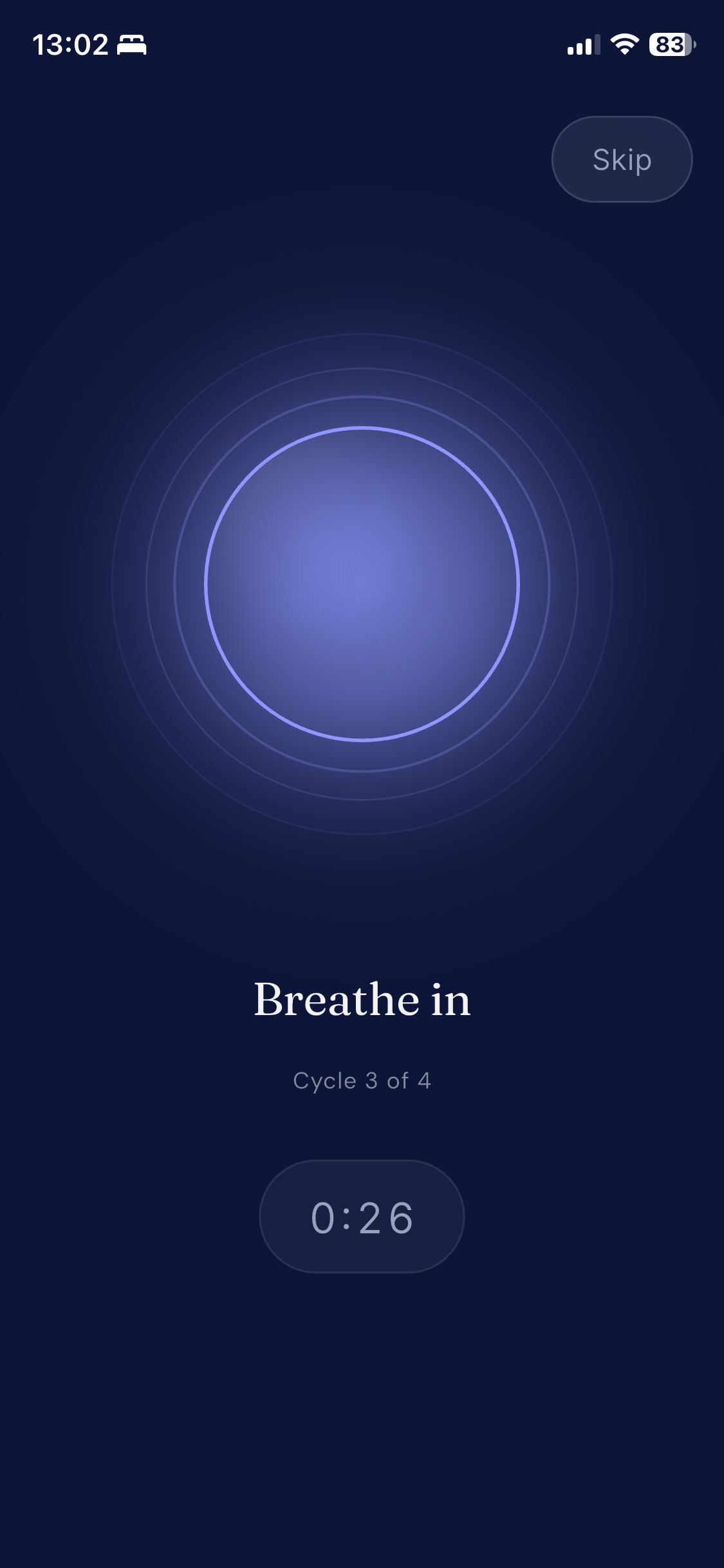 Breathing exercise screen showing 'Breathe in' with calming circular animation